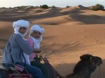 girls-in-desert-on-camels